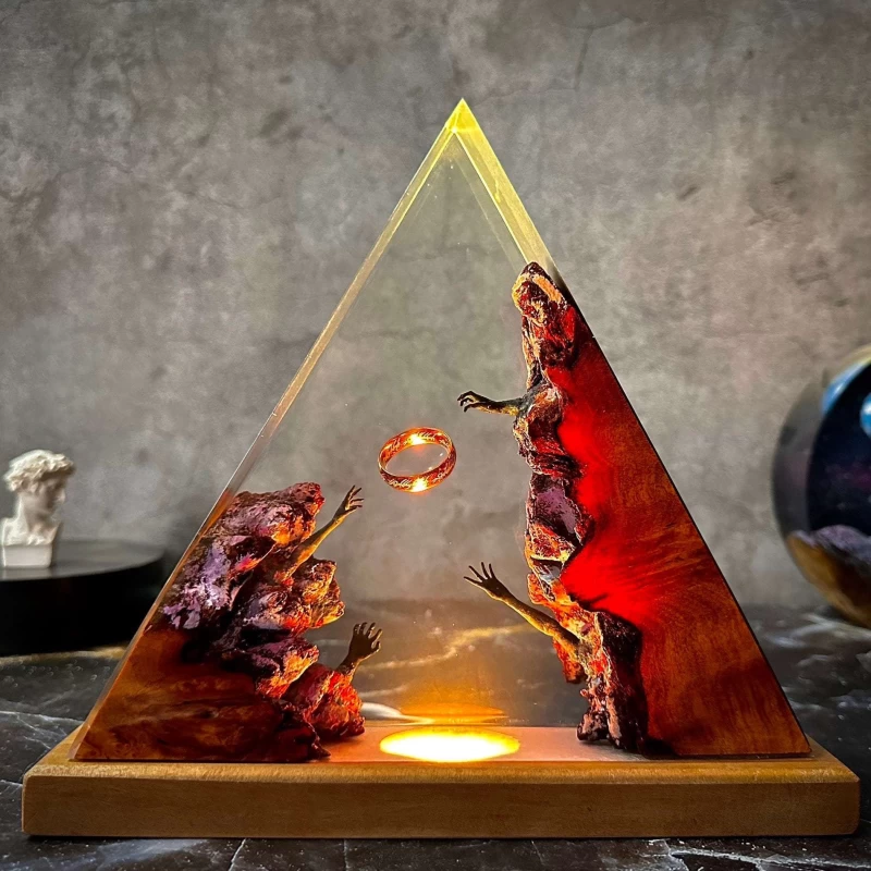 Sculptural Pyramid Light with Illuminated Hands and Ring